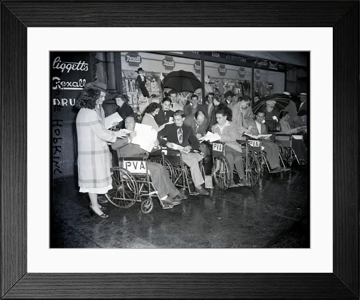 Framed Print : Women Taking Signatures From Wheelchair Framed Print : Women Taking Signatures From Wheelchair