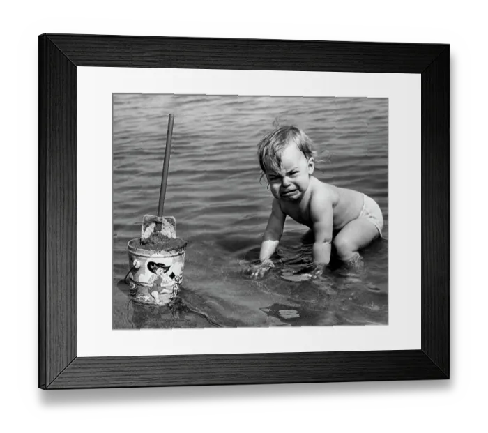 Framed Print : Unhappy Toddler in Cold Water at Beach Framed Print : Unhappy Toddler in Cold Water at Beach