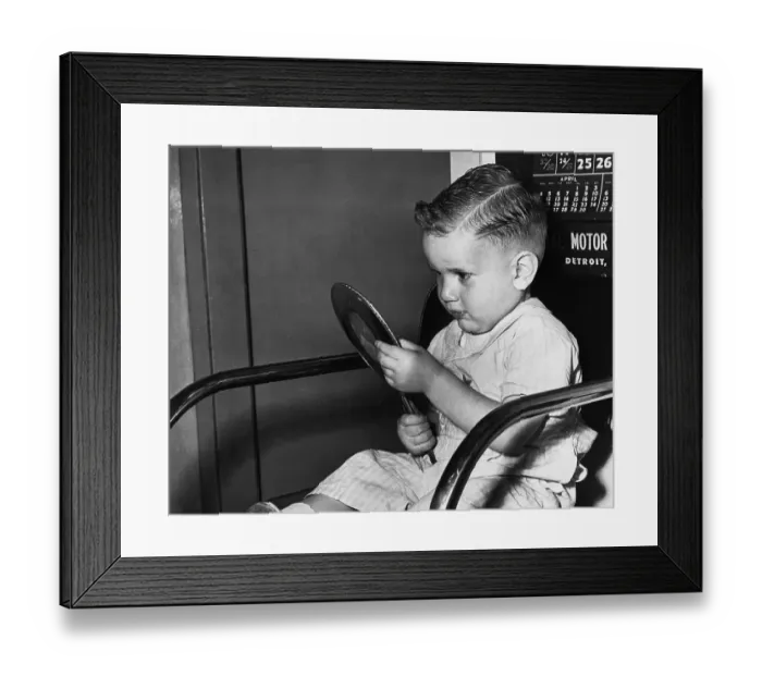 Framed Print : Boy (2-3) looking into mirror