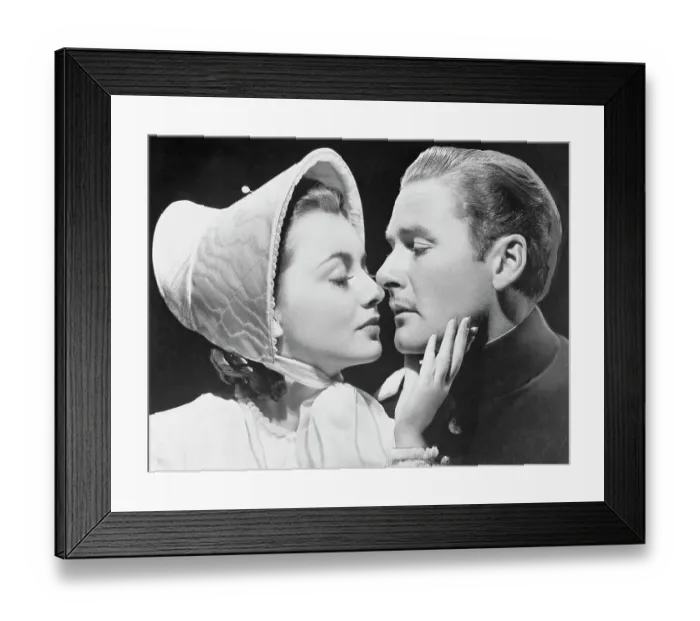 Framed Print : Errol Flynn Kissing Olivia de Havilland Framed Print : Errol Flynn Kissing Olivia de Havilland