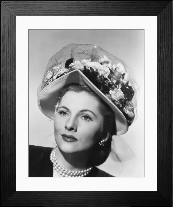 Framed Print : Joan Fontaine in Bonnet with Flowers on Top Framed Print : Joan Fontaine in Bonnet with Flowers on Top