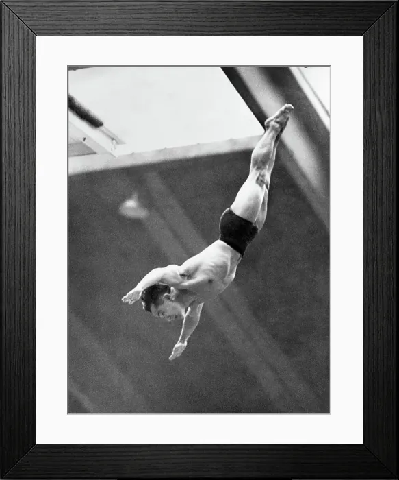 Framed Print : Sammy Lee of the U.S.A. seen in action during the first series of the men's Framed Print : Sammy Lee of the U.S.A. seen in action during the first series of the men's