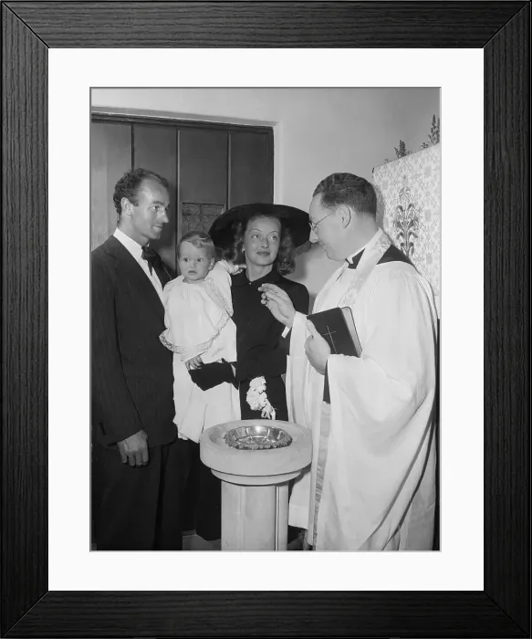 Framed Print : Actress Bette Davis at Her Daughter's Christening Framed Print : Actress Bette Davis at Her Daughter's Christening