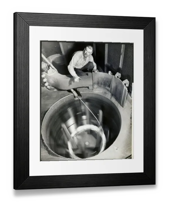Framed Print : Man Working at Steel Rod Machine Framed Print : Man Working at Steel Rod Machine