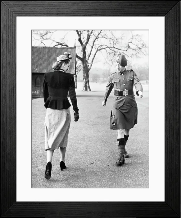 Framed Print : Soldier and Woman Exchanging Glances Framed Print : Soldier and Woman Exchanging Glances