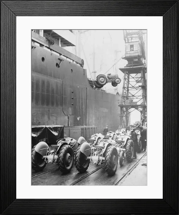 Framed Print : Tractors Being Loaded onto Boat Framed Print : Tractors Being Loaded onto Boat
