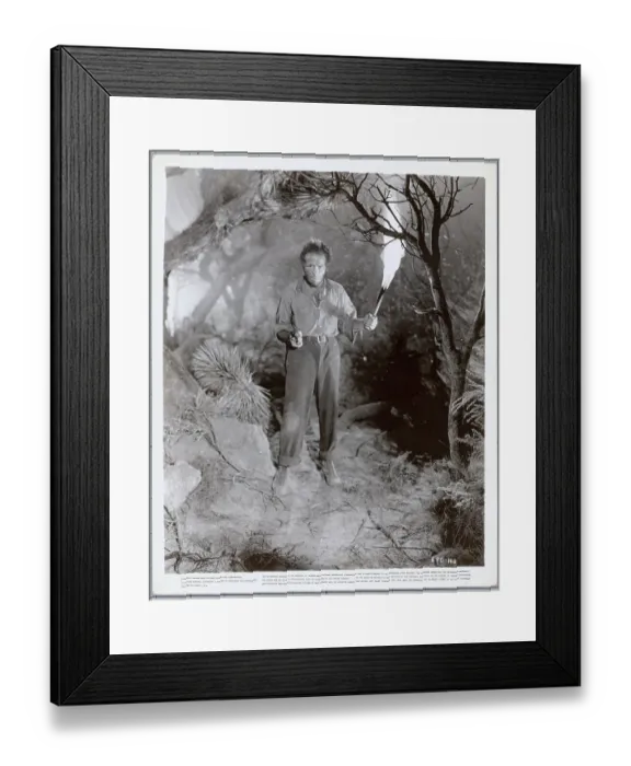 Framed Print : Humphrey Bogart Holding a Torch and Gun Framed Print : Humphrey Bogart Holding a Torch and Gun