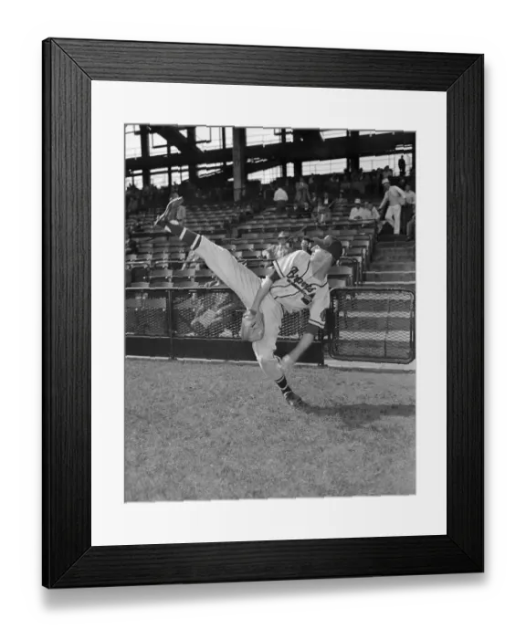 Framed Print : Baseball Player Pitching in Action Framed Print : Baseball Player Pitching in Action