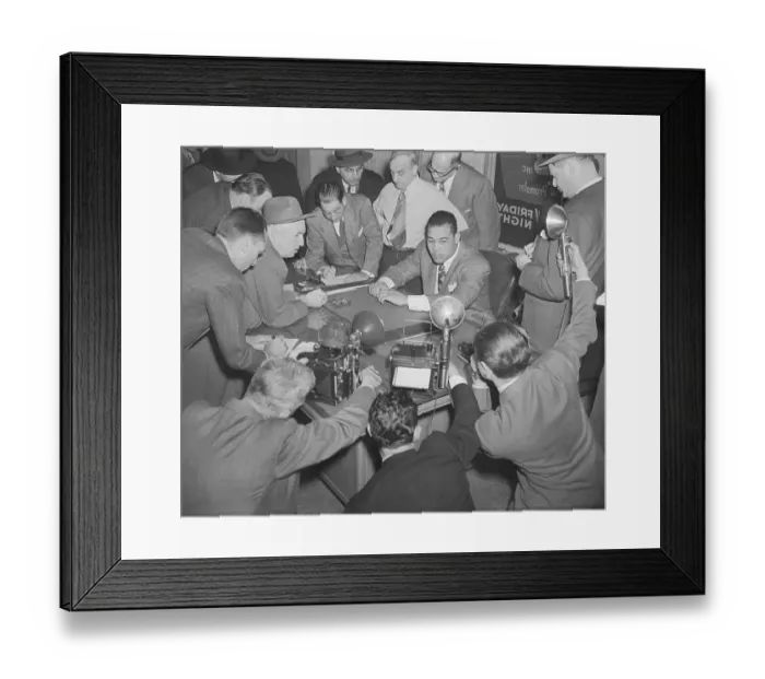 Framed Print : Joe Louis Shown Takling to Reporters Framed Print : Joe Louis Shown Takling to Reporters