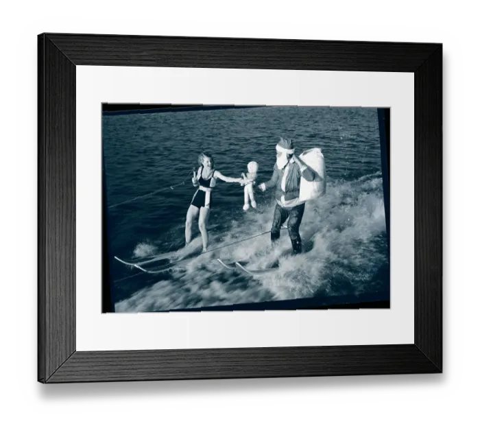 Framed Print : Santa Claus Water Skiing with Presents Framed Print : Santa Claus Water Skiing with Presents