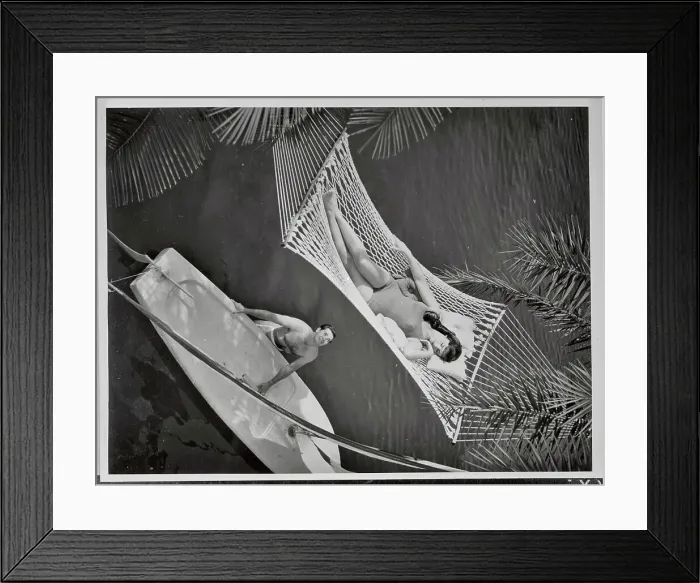 Framed Print : Woman in Hammock Being Gazed Upon by Man with Sailboat Framed Print : Woman in Hammock Being Gazed Upon by Man with Sailboat