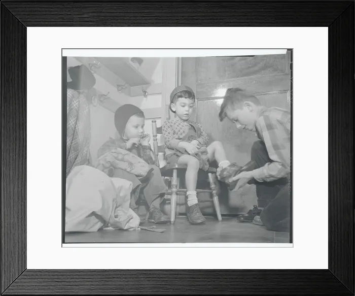 Framed Print : Boy Helping Dress Nursery Schoolers