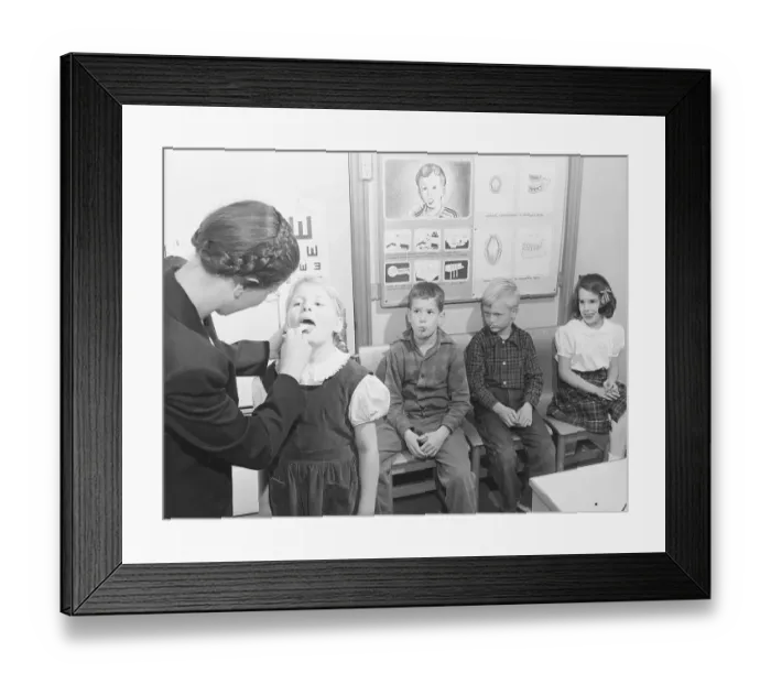 Framed Print : Nurse Checking Nursery Schooler's Teeth Framed Print : Nurse Checking Nursery Schooler's Teeth