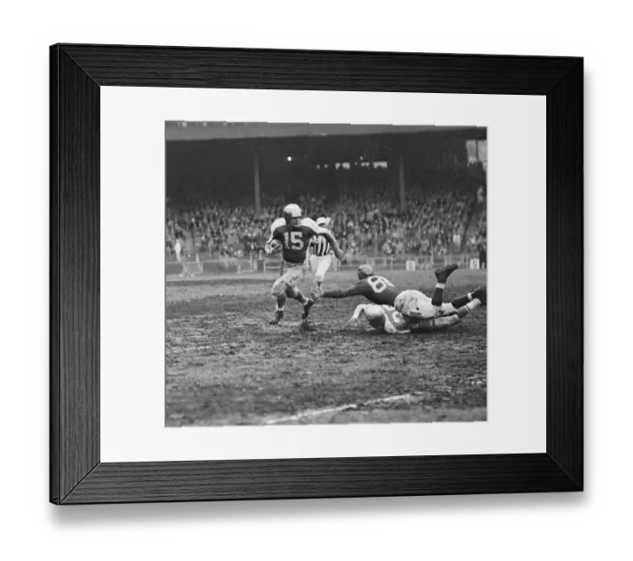 Framed Print : Football Player Evades Opponent Framed Print : Football Player Evades Opponent