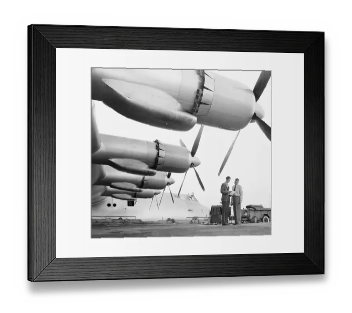 Framed Print : Two Men Standing by Wing of Hughes Flying Boat Framed Print : Two Men Standing by Wing of Hughes Flying Boat
