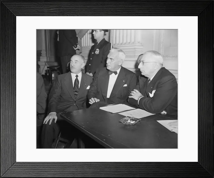 Framed Print : Movie Executives Listen to Hearings Framed Print : Movie Executives Listen to Hearings