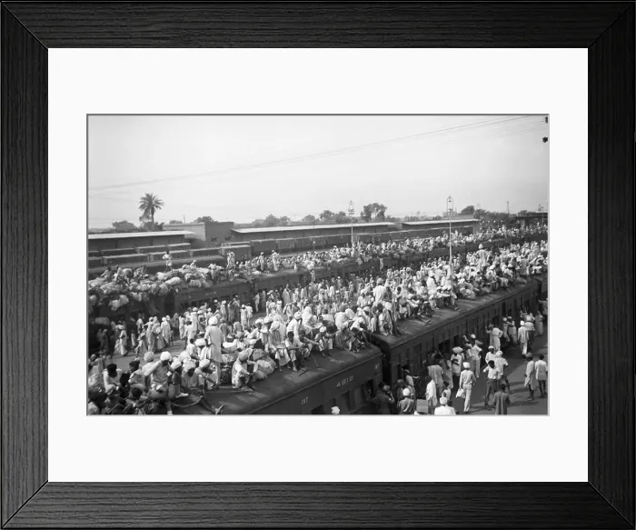 Framed Print : Indian Refugees Piling on Trains Framed Print : Indian Refugees Piling on Trains