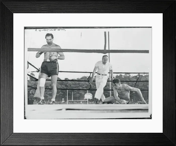 Framed Print : Referee Counting Out a Downed Boxer