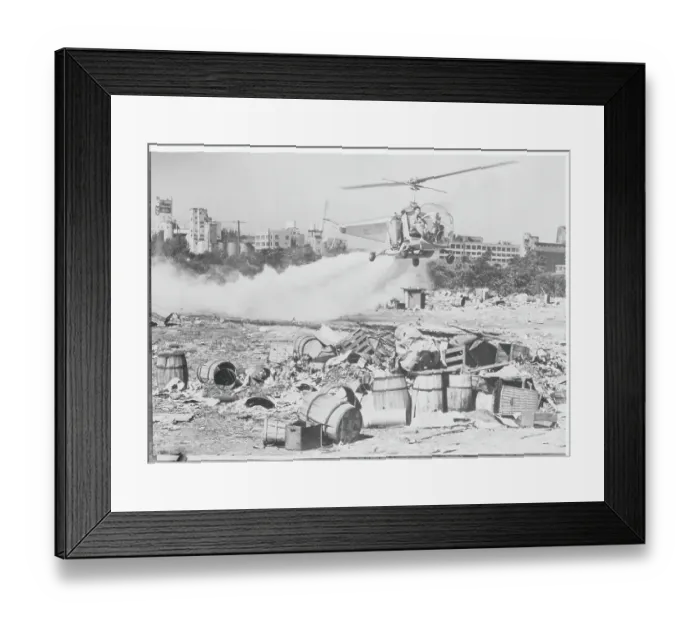 Framed Print : Helicopter Spraying Poison Framed Print : Helicopter Spraying Poison