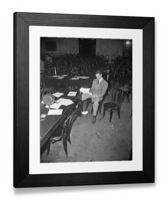 Framed Print : Howard Hughes Seated Reading Papers Framed Print : Howard Hughes Seated Reading Papers