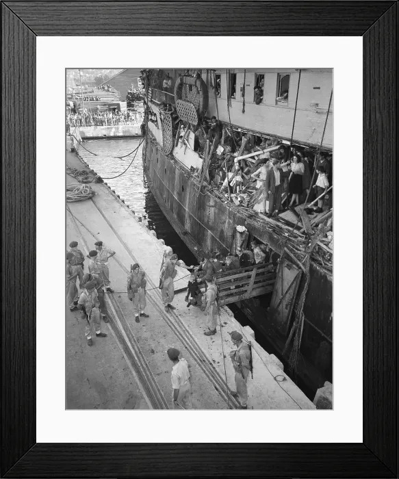 Framed Print : Refugees Leave Damaged Warship Framed Print : Refugees Leave Damaged Warship