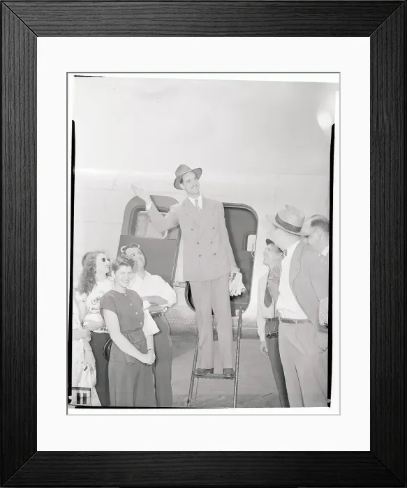 Framed Print : Howard Hughes Boarding Plane After Trial Framed Print : Howard Hughes Boarding Plane After Trial