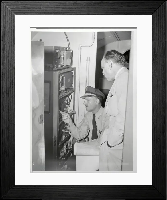 Framed Print : Jack Le Claire and James M Landis Inspecting Airplane Radar Framed Print : Jack Le Claire and James M Landis Inspecting Airplane Radar