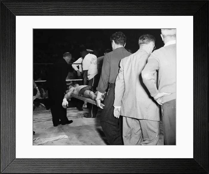 Framed Print : Doyle Carried on Stretcher After Fight
