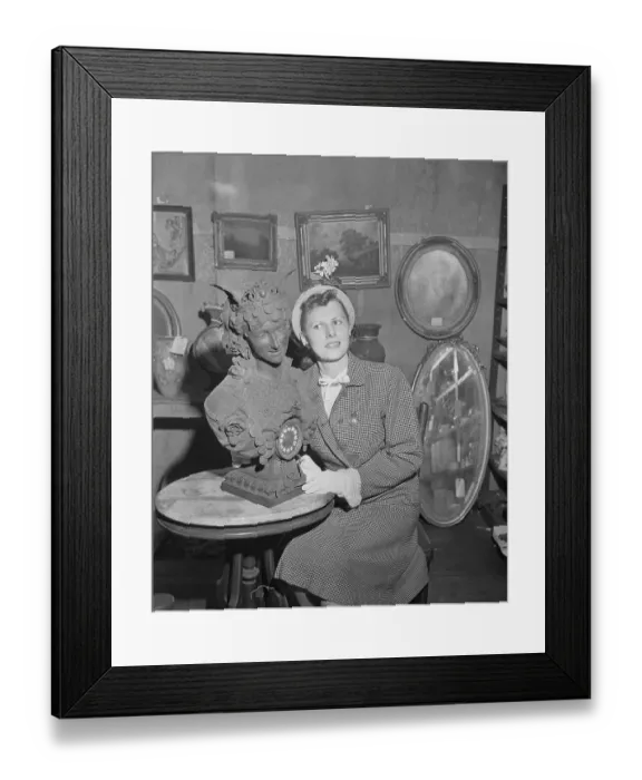 Framed Print : Pauline Delaney Posing Next to a Clock Framed Print : Pauline Delaney Posing Next to a Clock