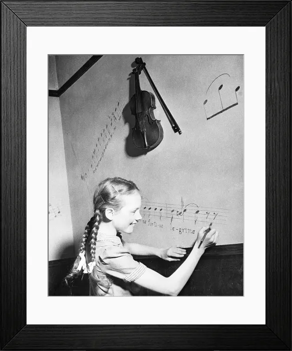 Framed Print : Julie Andrews Writing Music on Wall Framed Print : Julie Andrews Writing Music on Wall