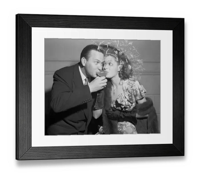 Framed Print : Man, Woman Drink Champagne From One Glass Framed Print : Man, Woman Drink Champagne From One Glass