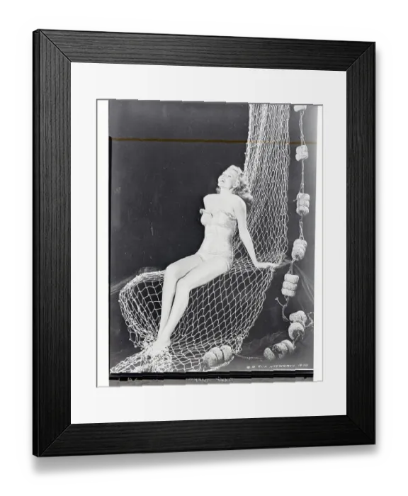 Framed Print : Rita Hayworth in Fishing Net