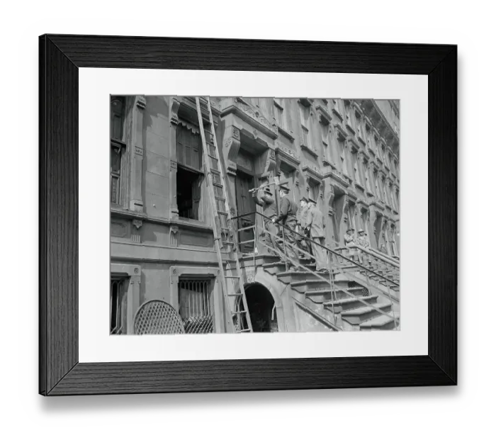 Framed Print : Policemen Applying an Ax to the Front Door of a House Framed Print : Policemen Applying an Ax to the Front Door of a House