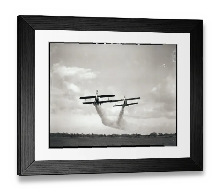 Framed Print : Stuntmen Ride Atop Wing of Plane