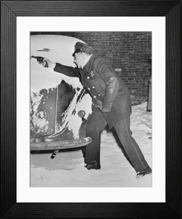 Framed Print : Policeman Shooting Gun Behind Car Framed Print : Policeman Shooting Gun Behind Car