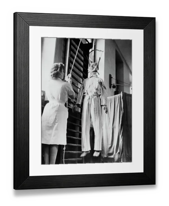 Framed Print : Man With Paralysis Hanging For Treatment