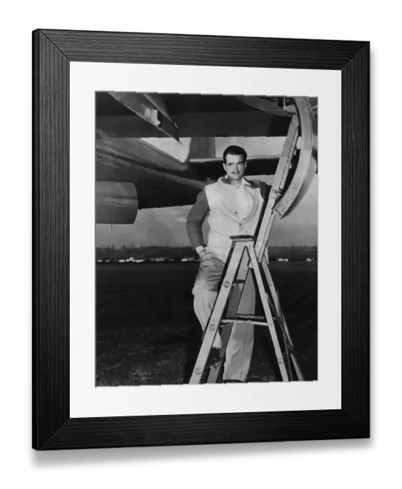 Framed Print : Howard Hughes Posing With Airplane Framed Print : Howard Hughes Posing With Airplane