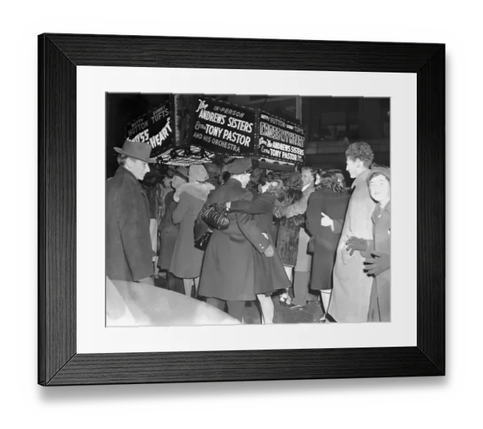 Framed Print : Woman Hugging Policeman Framed Print : Woman Hugging Policeman