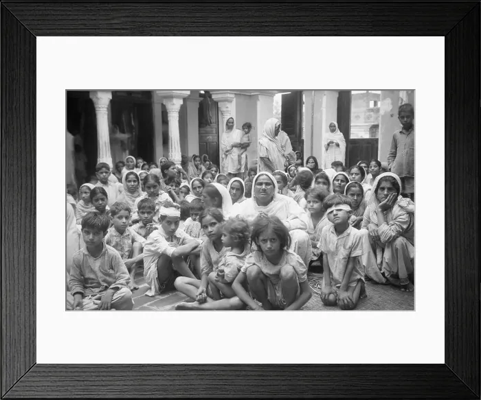 Framed Print : Women and Children Sitting on Floor Framed Print : Women and Children Sitting on Floor