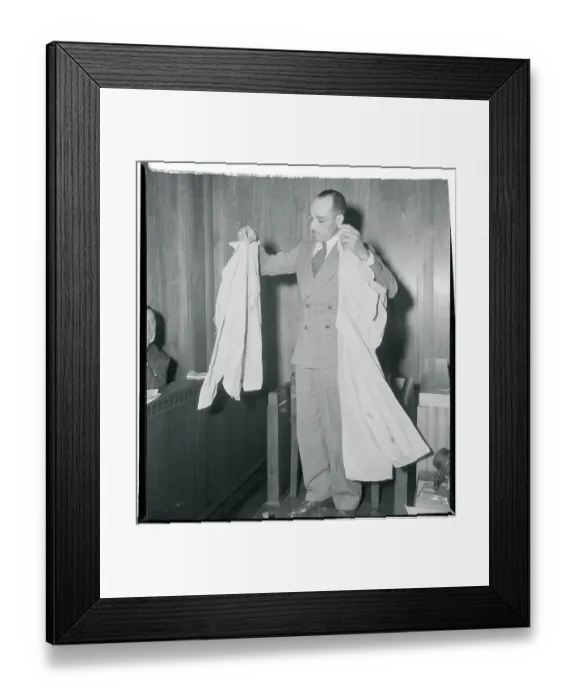 Framed Print : Richard E. Daniel Displaying Bloody Clothing at Senate Hearing