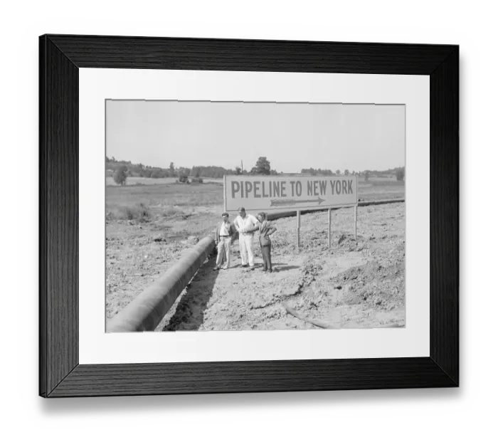 Framed Print : Pipeline With Sign Pointing To New York Framed Print : Pipeline With Sign Pointing To New York