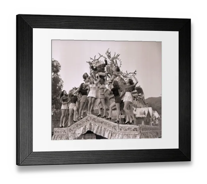 Framed Print : Santa Claus Riding a Sleigh with Models Framed Print : Santa Claus Riding a Sleigh with Models