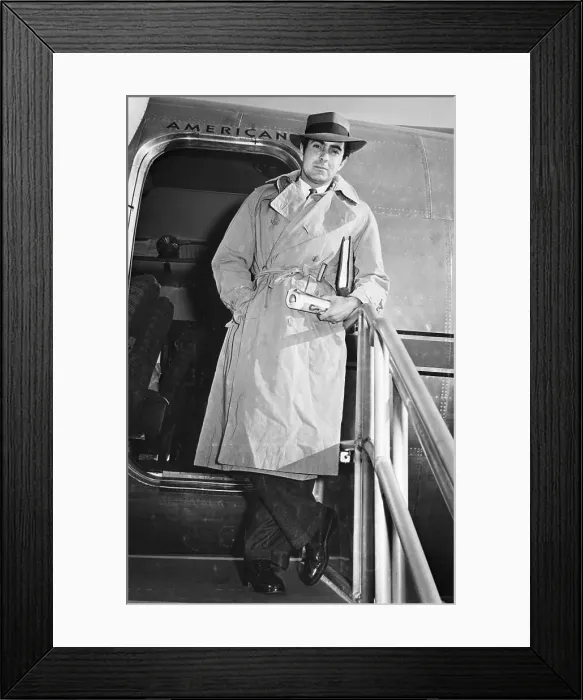 Framed Print : Tyrone Power Disembarking Airplane