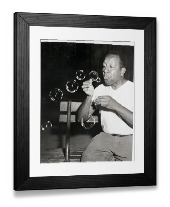 Framed Print : Artist Blowing Bubbles Framed Print : Artist Blowing Bubbles