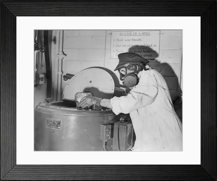 Framed Print : Man in Uniform Working with Radioactivity Framed Print : Man in Uniform Working with Radioactivity