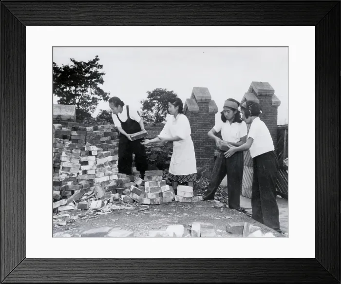 Framed Print : Students Helping to Rebuild Buildings