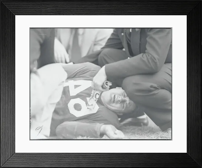 Framed Print : Ralph Foster Injured in Football Game Framed Print : Ralph Foster Injured in Football Game