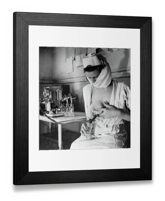 Framed Print : Woman Uses Apparatus To Draw Breast Milk Framed Print : Woman Uses Apparatus To Draw Breast Milk