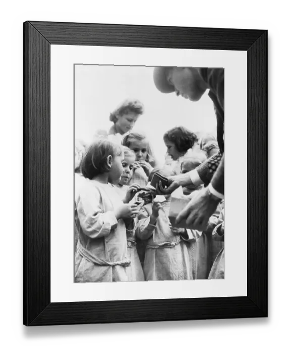 Framed Print : Newton Randolph Handing Out Crackers Framed Print : Newton Randolph Handing Out Crackers