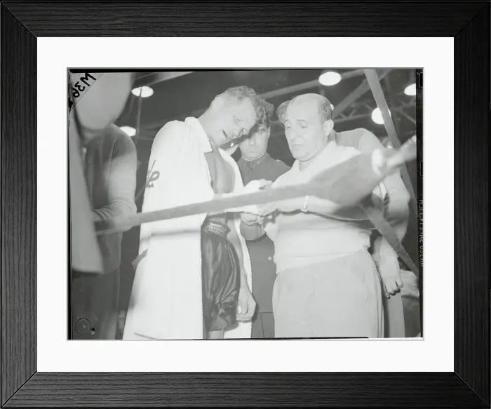 Framed Print : Tony Zale Getting Hand Examined After Fight Framed Print : Tony Zale Getting Hand Examined After Fight